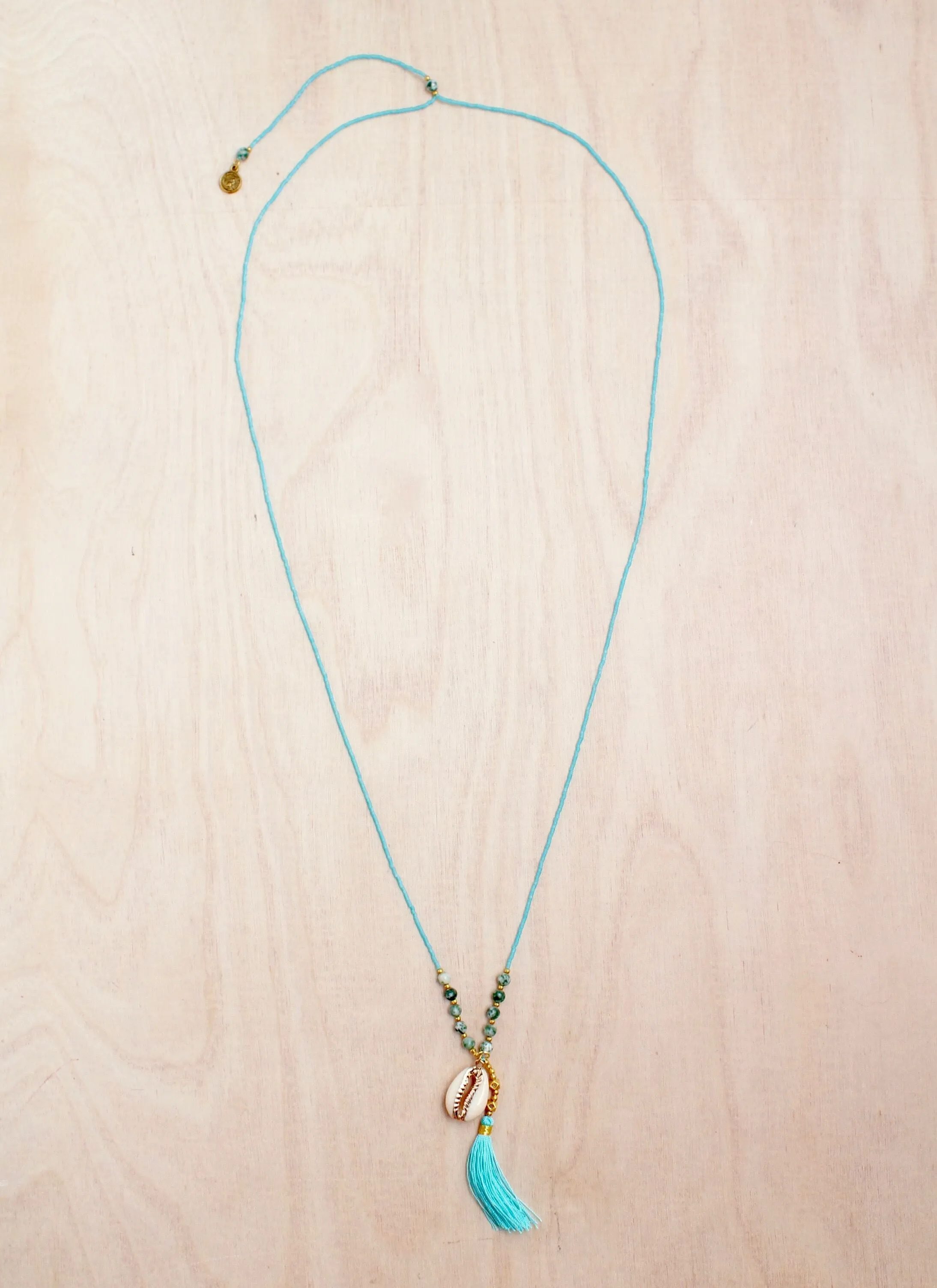 Gold Cowrie Tassel Necklace