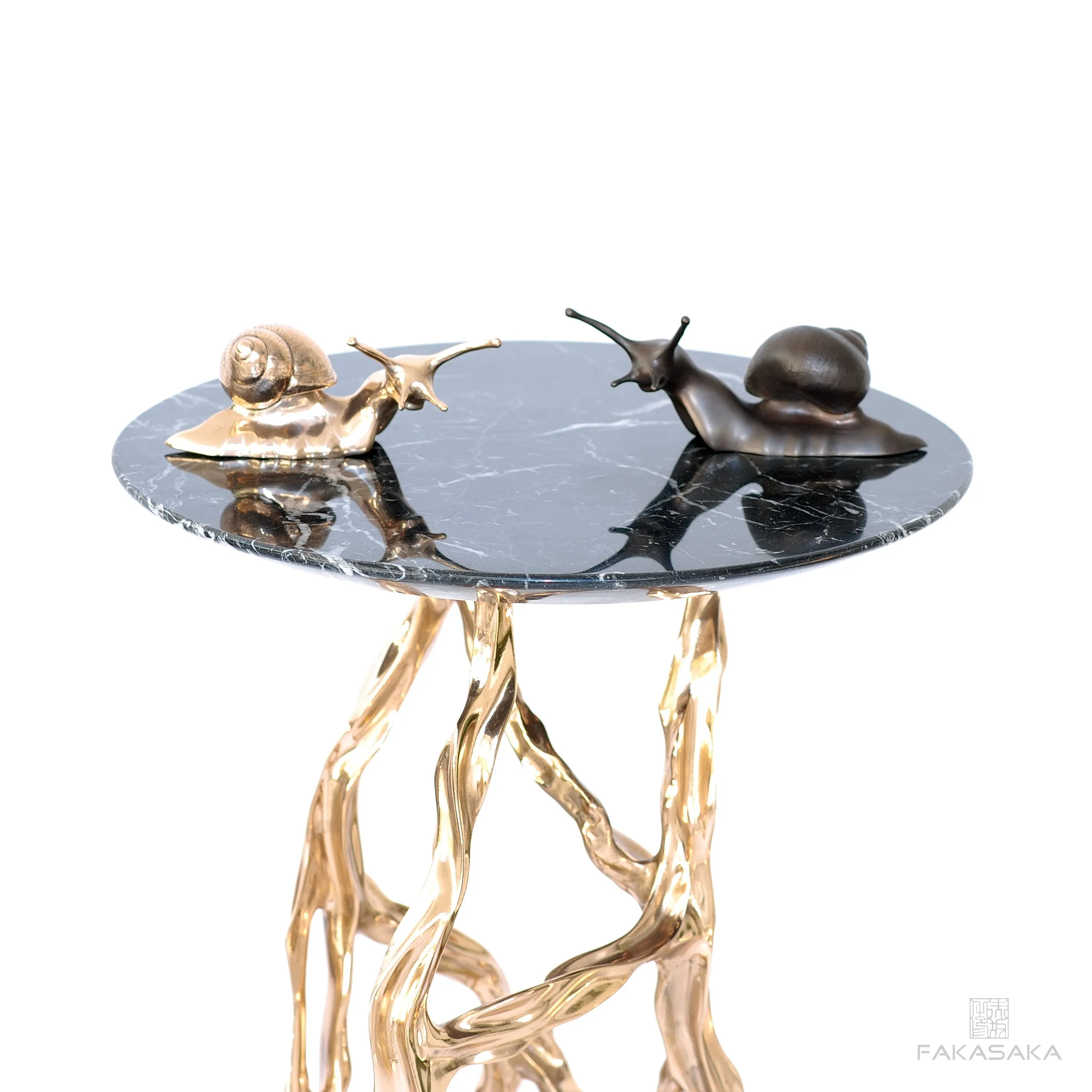 NUI<br><br>SCULPTURE / PAPER WEIGHT / DOOR HOLDER<br><br>POLISHED BRONZE<br>ONYX BASE